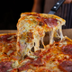 Illustration for article titled Last Call: Are you in or out on Christmas-caroling pizza?